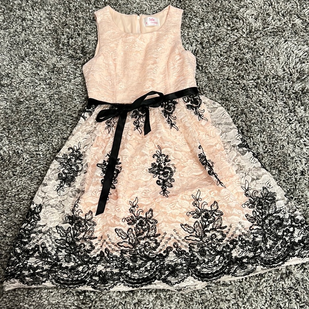 Pink with black lace at the bottom.